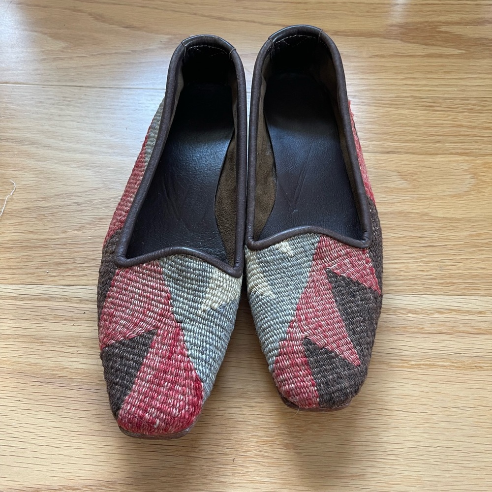 Artemis woven flats made of Turkish tapestry and line with leather.